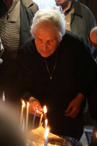 "Zia Natalina" lights the Chanukah menorah at Sinagoga Ner Tamid del Sud, Serrastretta Italy. photo credit:  Domenico Pulice