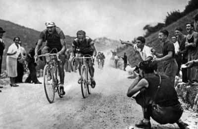 August 24, 1938. Italy’s riders Gino Bartali (L) and Olimpio Bizzi (R), competing in the Giro d’Italia (Tour of Italy) cycling race. AFP.