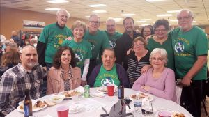 Chuck Giomuso with friends and members of St. Paschal’s Helping Hands.