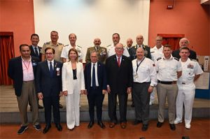 Joseph Lonardo, NIAF General Counsel (5th from left) with dignitaries and speakers at the Peace, Security and Prosperity Conference, Catania Museo Storico, Sicily on July 7, 2023; including Dr. John Curatolo, historian, National WWII Museum (1st row left); Ms. Tracy Roberts-Pounds, United States Consul General, Naples (1st row 3rd from left); The Rt Hon Edward Llewellyn, UK Ambassador to Italy (between Tracy Roberts-Pounds and Joseph Lonardo); Steve Gregory, founder, the International Forum for Peace, Security and Prosperity (right of Joseph Lonardo); Admiral Stuart Munsch, USN - Commander, U.S. Naval Forces, Europe/Commander, U.S. Naval Forces, Africa/Commander, Allied Joint Forces Command, Naples (2nd row, 2nd from left); Italian Army Commander in Sicily, Major General Maurizio Angelo Scardino (2nd row, 3rd from left). Photo Credit: Adnkronos