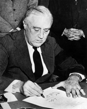President Roosevelt signing the declaration of war against Japan, Dec. 11, 1941; Library of Congress.