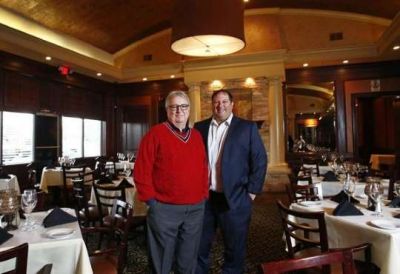 © Provided by The Columbus Dispatch William Lalli, left, and his son, Nick Lalli, right, in their restaurant, Vittoria Prime Italian Steakhouse, last year. [Fred Squillante/Dispatch]Gitto, Jr.