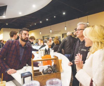 Fairlawn’s new Café Arnone is the brainchild of first cousins Michael Maghes and Rocco LaRose  (pictured here serving guests during the grand opening). (Photography: Chris Callaway)