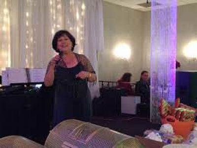 An Evening of Giving Thanks with Carmelina