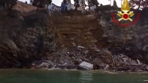 A landslide plunges a 100-year-old cemetery into the sea