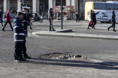Locals in Rome have taken to the streets to cover the city&#039;s potholes with spray paint
